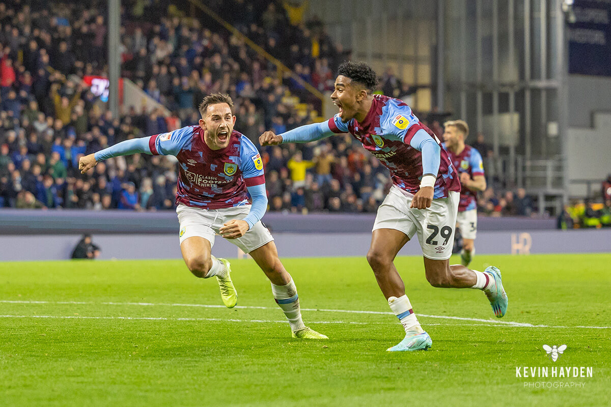 Burnley's Josh Brownhill and Ian Maatsen celebrate a goal against Rotherham at Turf Moor, Burnley. Photo by Kevin Hayden.