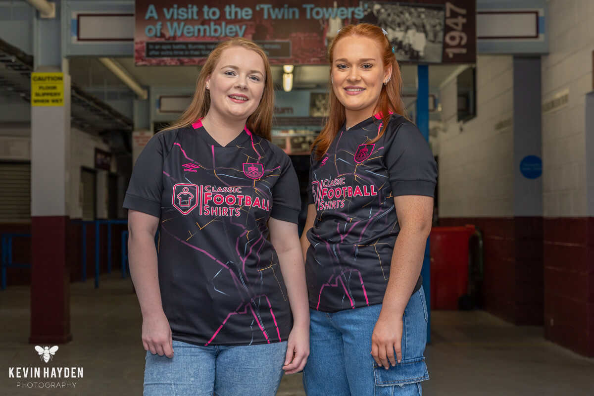 Burnley's 3rd kit fan reveal, two sisters under the Cricket Field Stand, Turf Moor, Burnley. Photo by Kevin Hayden.