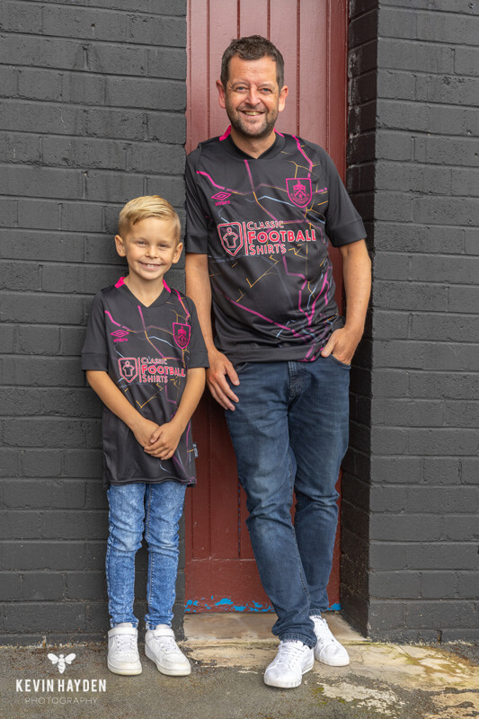 Burnley's 3rd kit fan reveal, Dad and lad outside the turnstiles at Turf Moor, Burnley. Photo by Kevin Hayden.