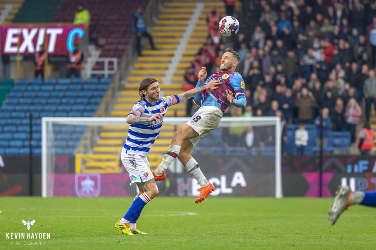 Burnley's Josh Brownhill goes up for a header against Reading in an EFL Championship game at Turf Moor, Burnley. Photo by Kevin Hayden.