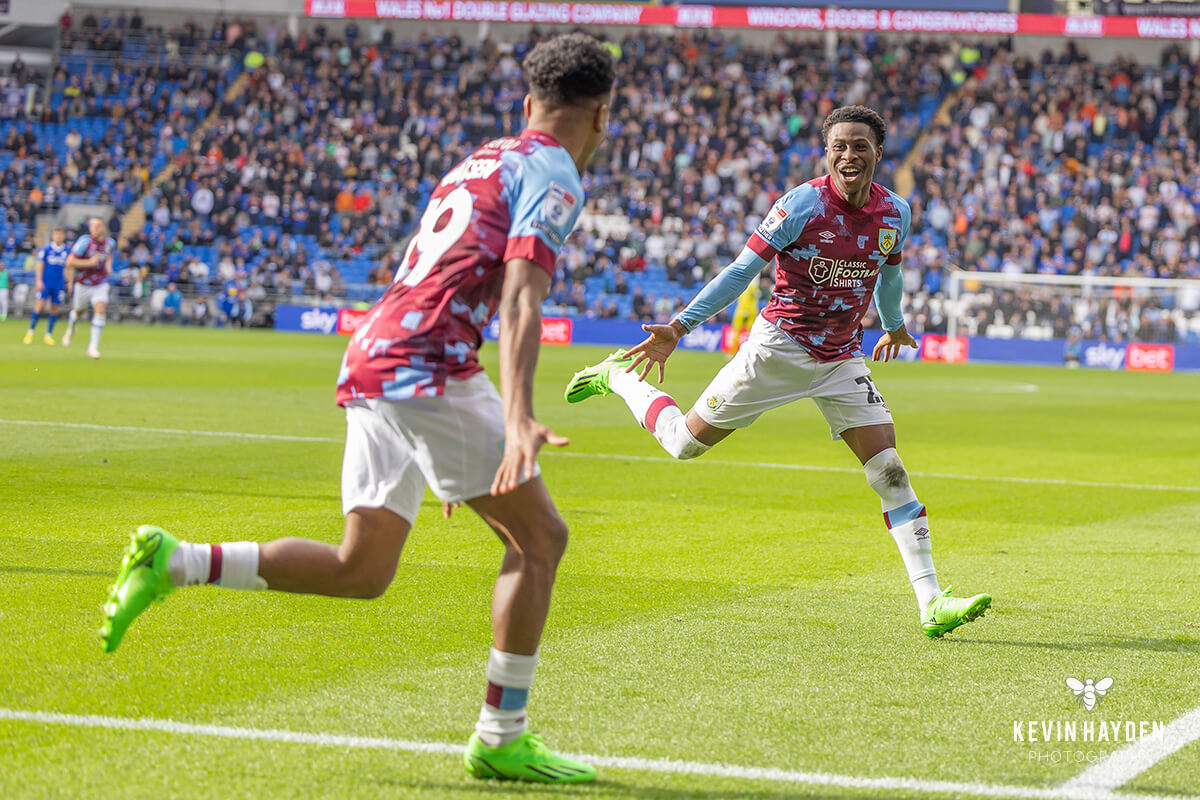 Burnley's Nathan Tella and Ian Maatsen celebrate a goal against Cardiff City. Photo by Kevin Hayden.