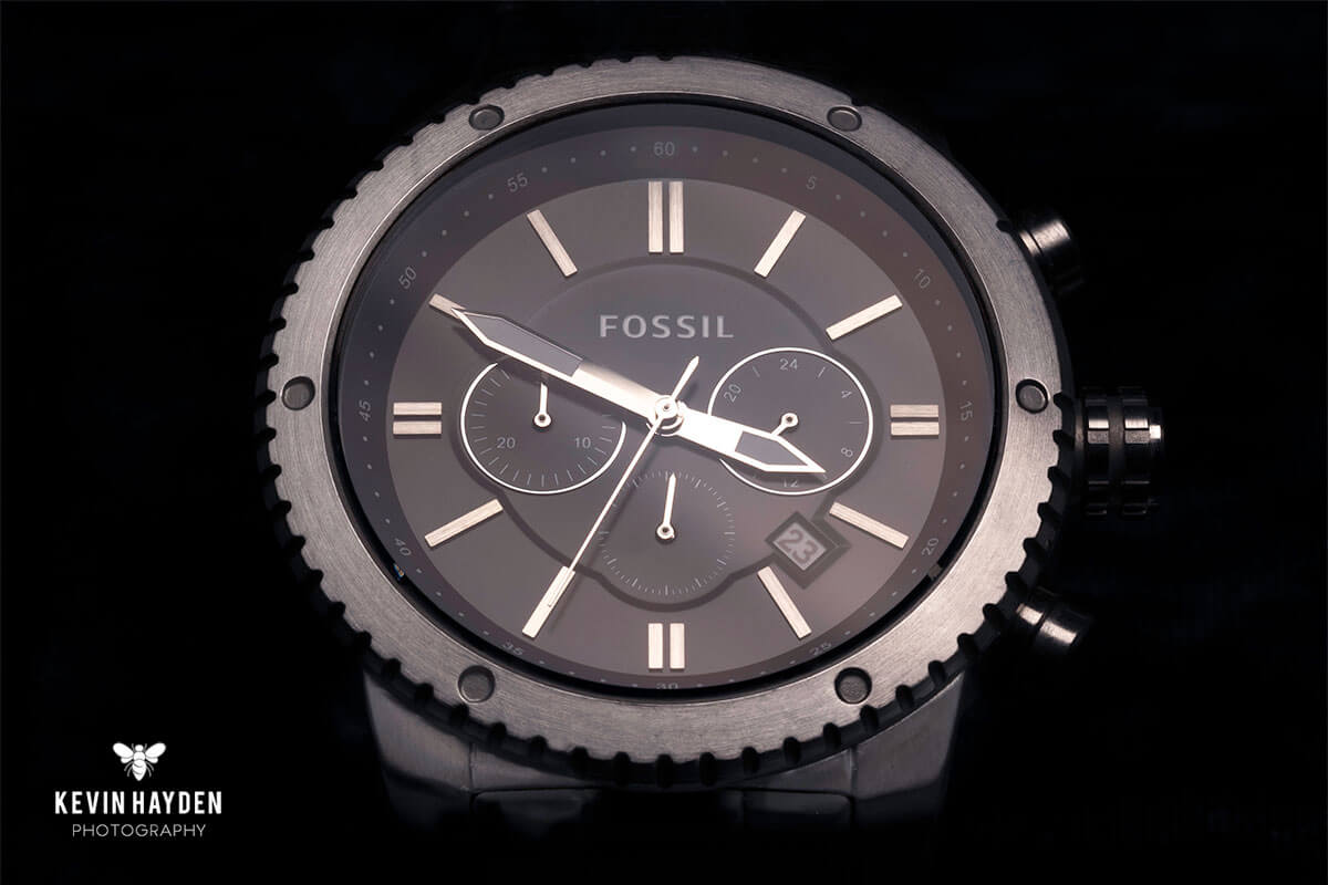 Studio shot of mens Fossil wrist watch. Photo by Kevin Hayden.