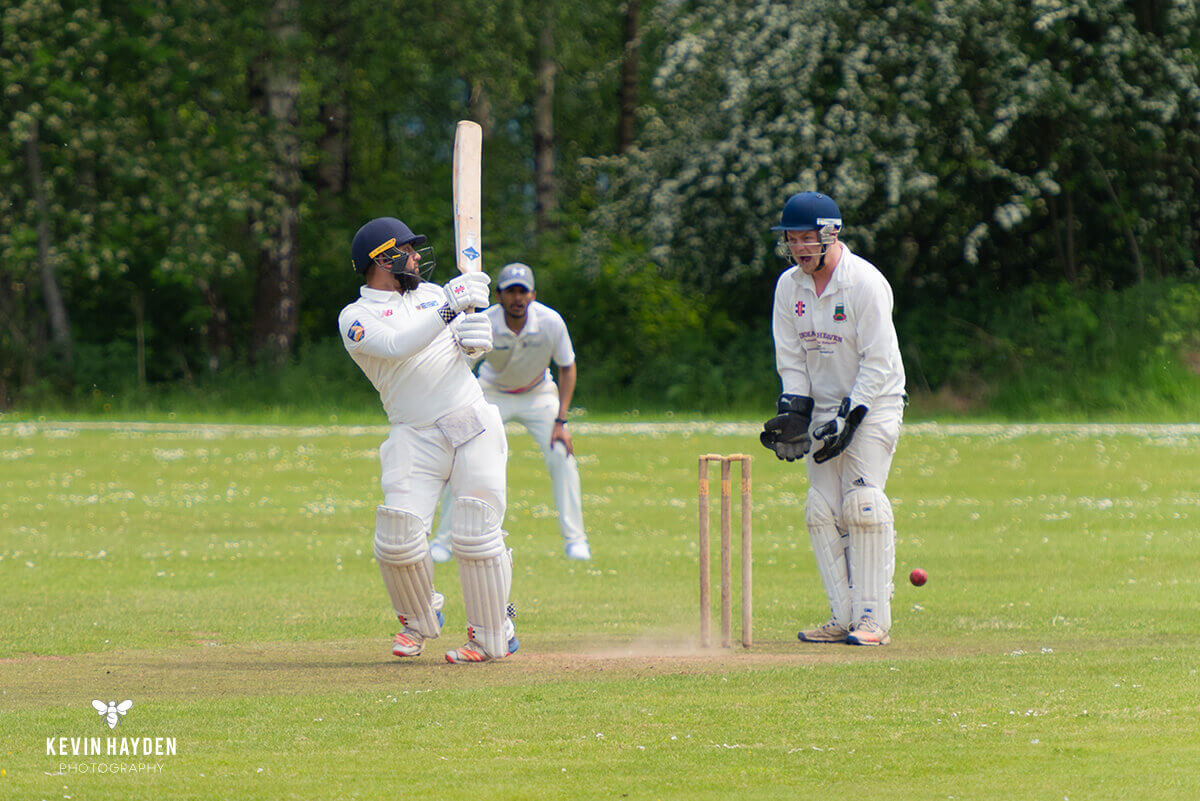 The Chester wicket keeper fails to hold on, University of Bolton v University of Chester cricket match. Photo by Kevin Hayden.
