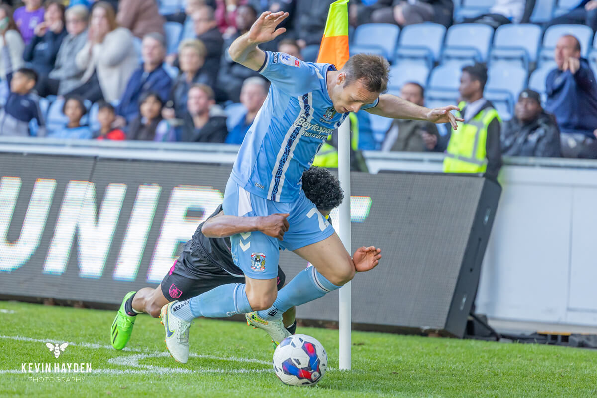Ian Maatsen of Burnley tackles a Coventry player in the EFL Championship game, Coventry Building Society Arena, Coventry. Photo by Kevin Hayden.
