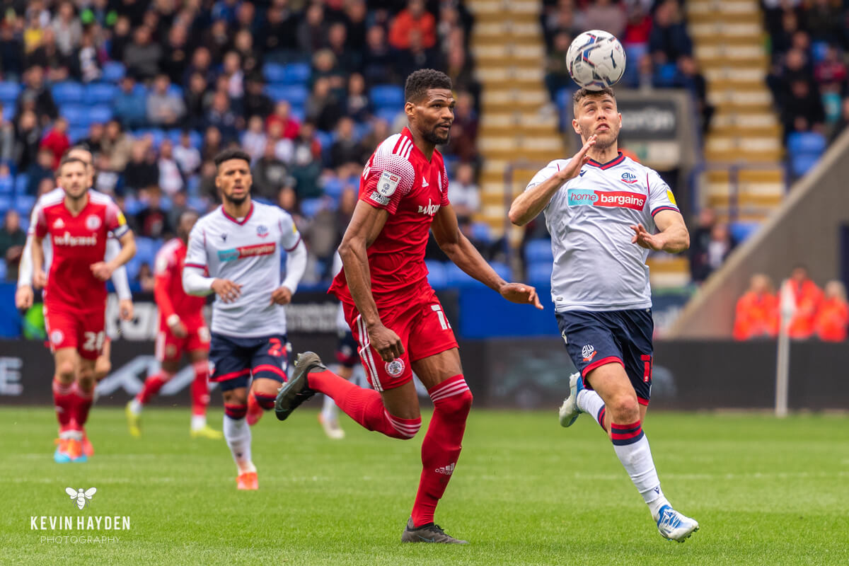 Bolton Wanderer's player Dion Charles heads the ball against Accrington Stanley in an EFL Division One game at the Bolton University Stadium, Bolton. Photo by Kevin Hayden.. Photo by Kevin Hayden.
